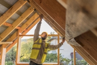 Carpenter Man Working On Roof